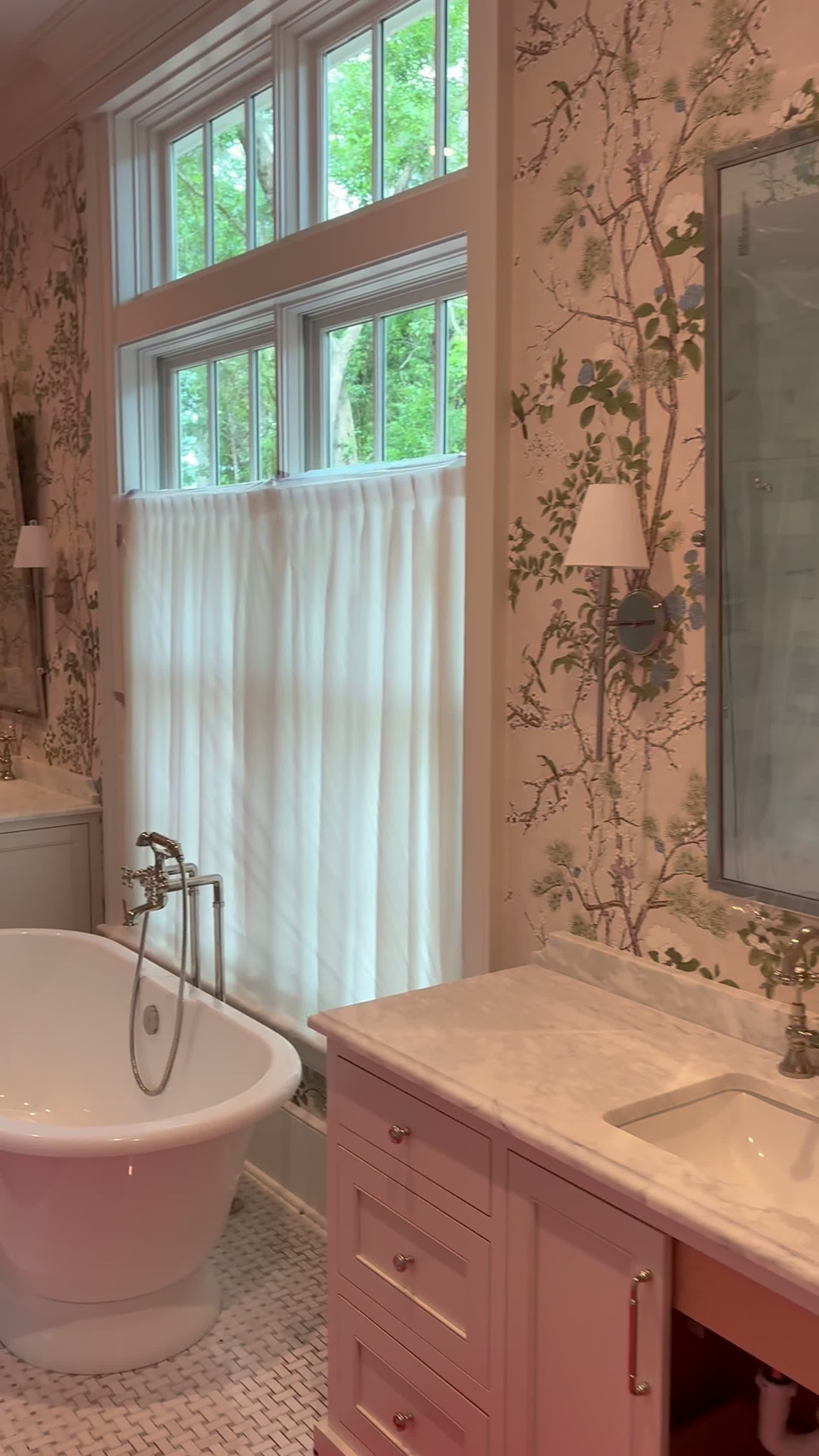 Chinoiserie bath with clawfoot tub, marble vanity and garden window