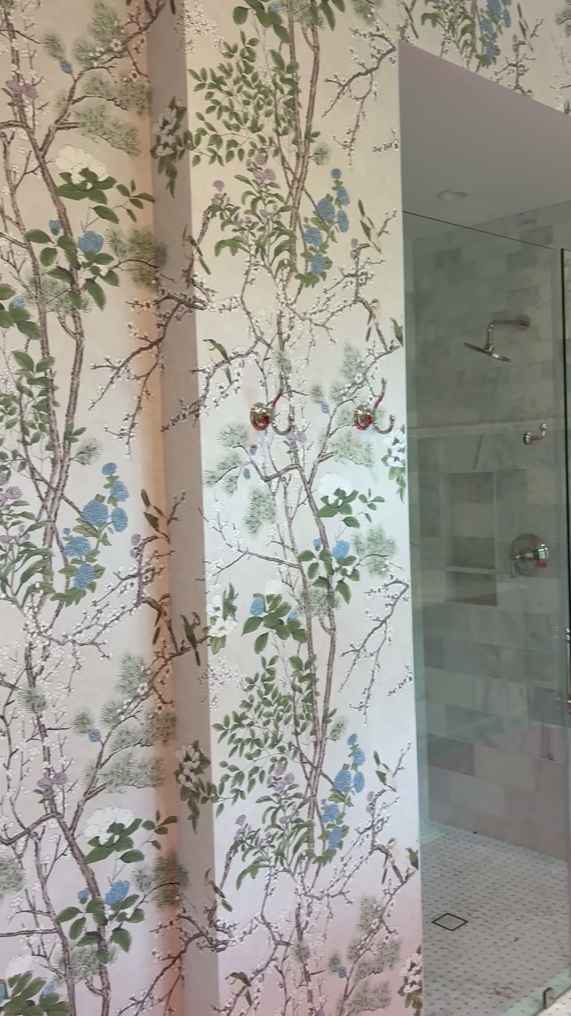 Hand-hung chinoiserie panels wrapping an inside corner